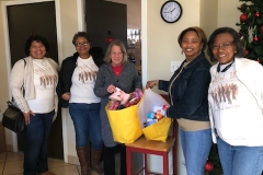 NHBW Members December 2017 donating medicine and slippers to Grayson County Shelter