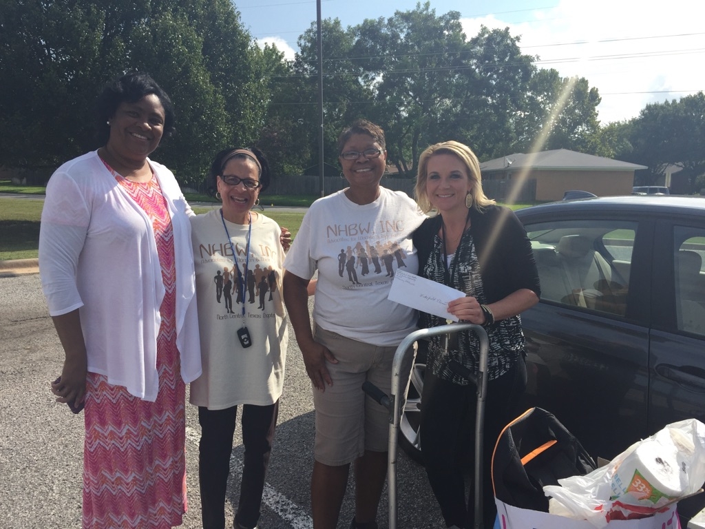 Wakefield ES Principal Eartha Linson and Teacher Colleen Blake with NHBW members Eleanor Edmund and Colletta Pierce